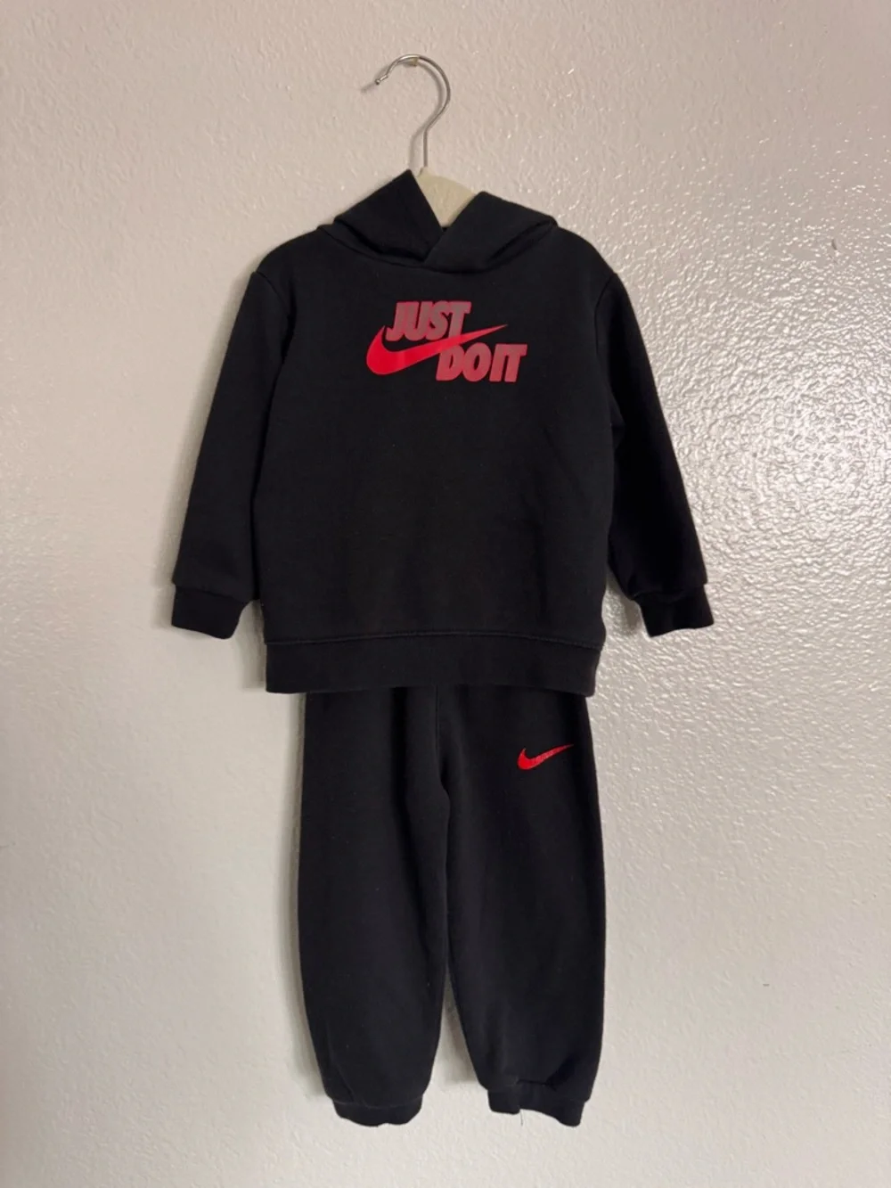Nike Black Kids Hoodie & Joggers with Red Swoosh - Picture 1 of 5